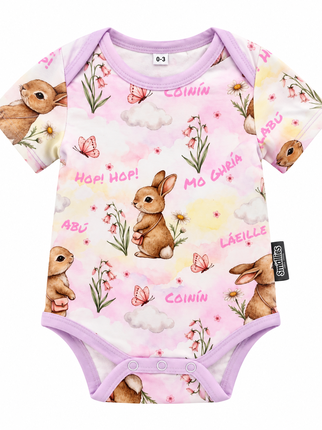 Children wearing colourful zipped sleepsuits