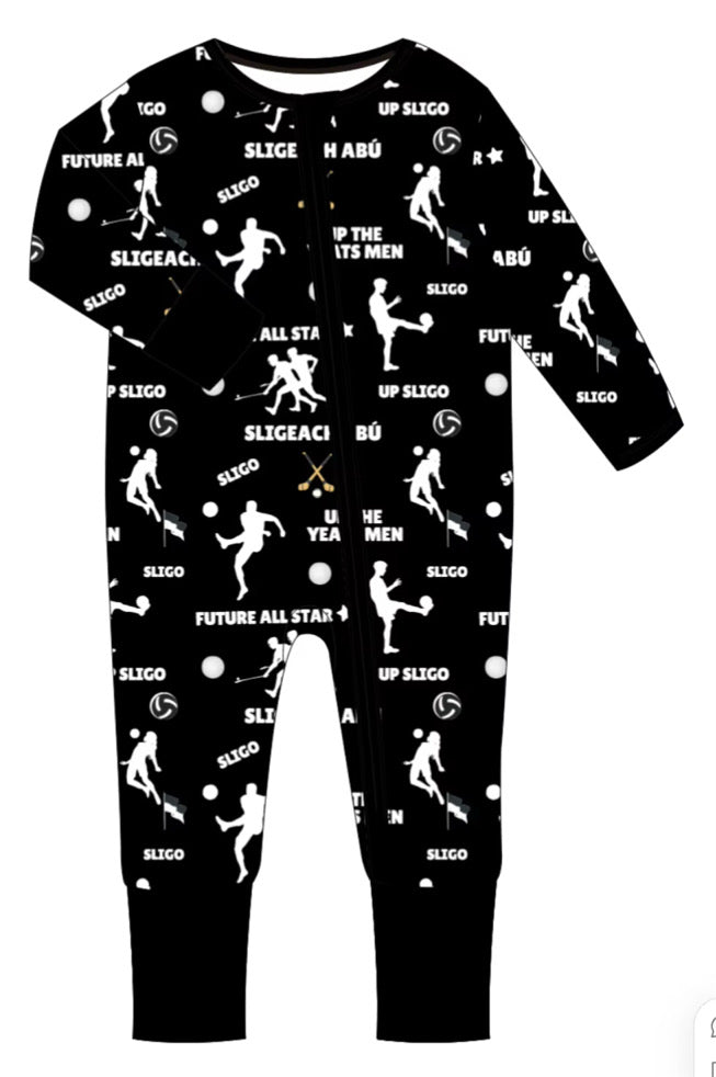 Child wearing zipped sleepsuit